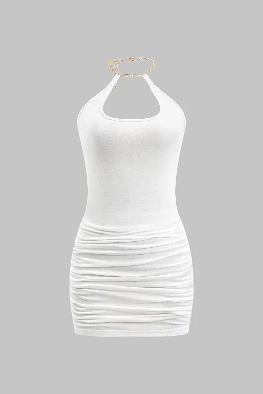 Mini dresses with tassel accents for a fun touch Metallic Chain Cut Out Sleeveless Mini Dress Mini dresses with tassel accents for a fun touch Metallic Chain Cut Out Sleeveless Mini Dress