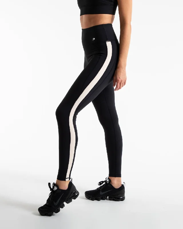 Women's High - Waisted Tight Trousers with Side Slits in Beige for a Trendy LookAlicia Leggings - Black Women's High - Waisted Tight Trousers with Side Slits in Beige for a Trendy LookAlicia Leggings - Black