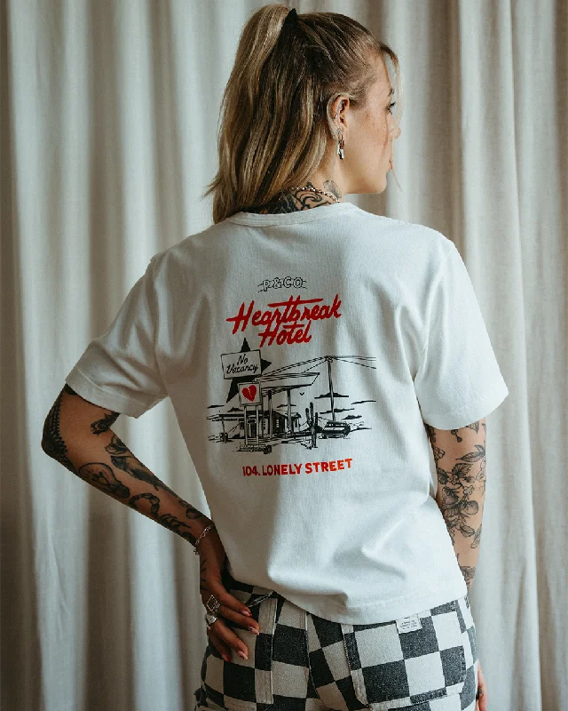 Distressed Women T Shirt with a Laid - Back AestheticHeartbreak Hotel T-Shirt - Off White Distressed Women T Shirt with a Laid - Back AestheticHeartbreak Hotel T-Shirt - Off White