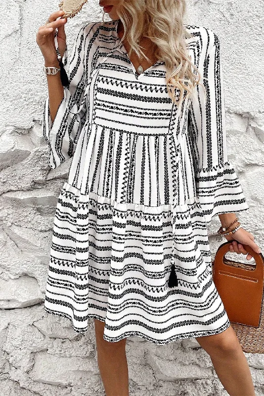 Midi dresses with pom - pom trims for a playful and festive lookStripe V-Neck Bell Sleeve Mini Dress Midi dresses with pom - pom trims for a playful and festive lookStripe V-Neck Bell Sleeve Mini Dress