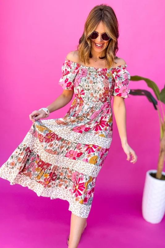 Midi dresses with ruffled sleeves for a more feminine and voluminous lookLight Pink Floral And Animal Print Smocked Puff Sleeve Midi Dress Midi dresses with ruffled sleeves for a more feminine and voluminous lookLight Pink Floral And Animal Print Smocked Puff Sleeve Midi Dress