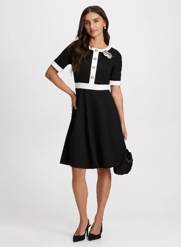 Midi dresses with ruffled sleeves for a more feminine and voluminous lookRosette Embellished Knit Dress Midi dresses with ruffled sleeves for a more feminine and voluminous lookRosette Embellished Knit Dress