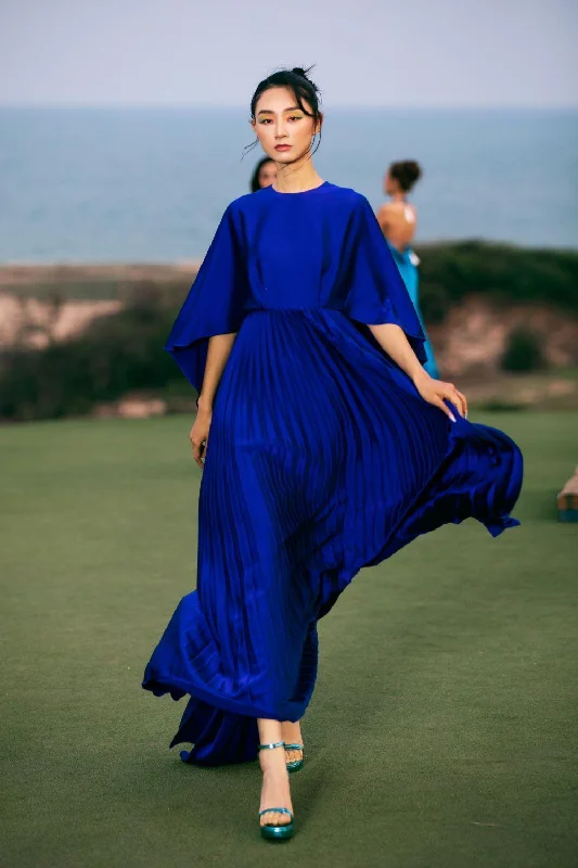 Maxi dresses with a criss - cross back for a flirty and unique detailOphelia Pleated Flared Latin Silk Maxi Dress Maxi dresses with a criss - cross back for a flirty and unique detailOphelia Pleated Flared Latin Silk Maxi Dress