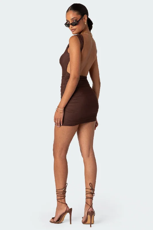 Mini dresses with criss - cross backs for a flirty lookMikey Ruched Open Back Mini Dress Mini dresses with criss - cross backs for a flirty lookMikey Ruched Open Back Mini Dress