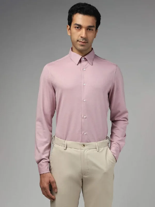 Ruffled Hem Women Shorts to Add a Feminine TouchWES Formals Solid Dusty Pink Cotton Blend Slim-Fit Shirt Ruffled Hem Women Shorts to Add a Feminine TouchWES Formals Solid Dusty Pink Cotton Blend Slim-Fit Shirt