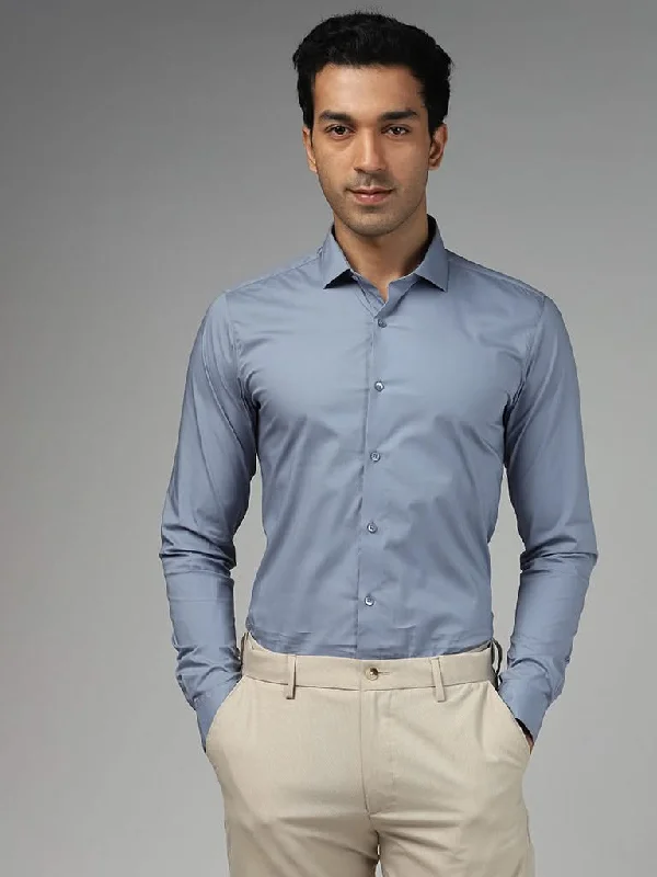Ruffled Hem Women Shorts to Add a Feminine TouchWES Formals Solid Ultra-Slim Fit Light Blue Cotton Blend Shirt Ruffled Hem Women Shorts to Add a Feminine TouchWES Formals Solid Ultra-Slim Fit Light Blue Cotton Blend Shirt